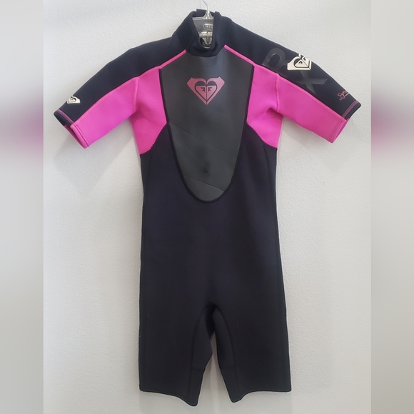 Girls Roxy wetsuit back and pink size 14